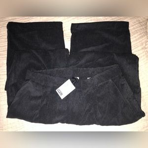 H&M Divided loose fit corduroy pants. Black, Size L. NWT.